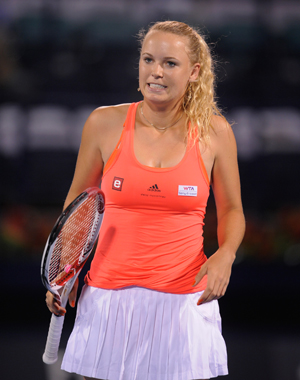 Caroline Wozniacki, Bernard Tomic advance at Eastbourne